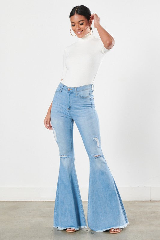 DISTRESSED FLARE JEANS